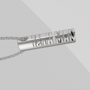 Close-up of sterling silver oval tag necklace featuring the vertical ‘12th Man’ cutout.